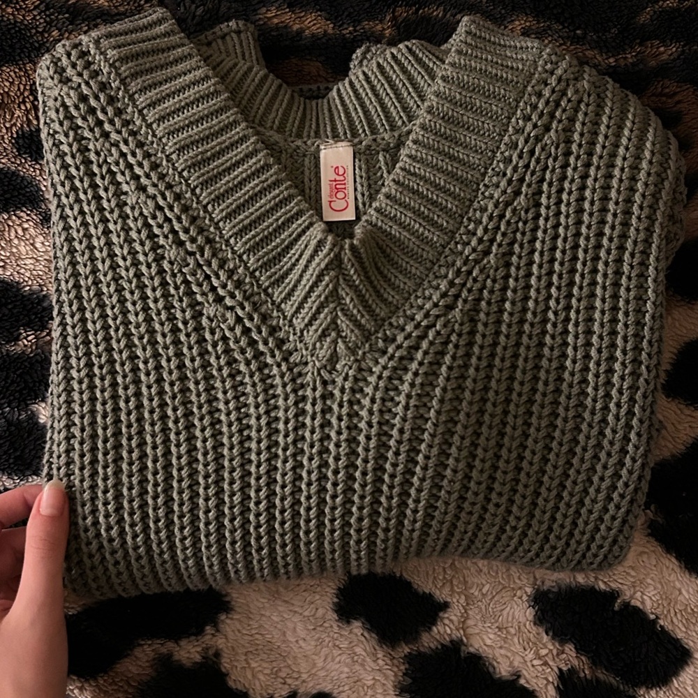Knitted sweater in olive color. Made in Italy. Size S